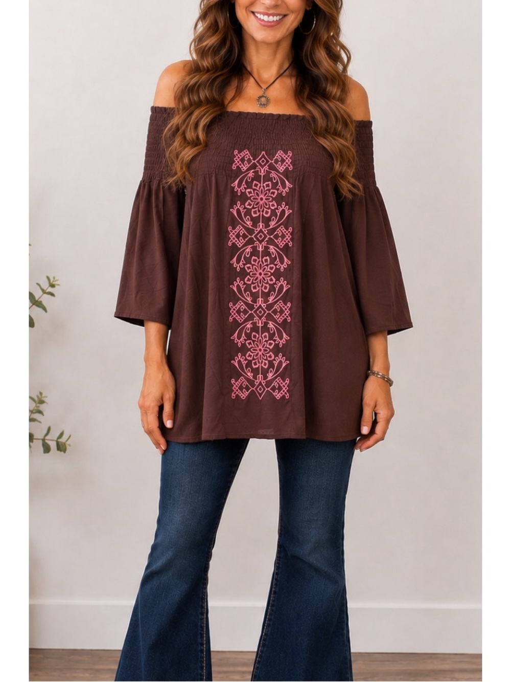 Chocolate brown Loose, flowy off-the-shoulder smocked top with pink embroidery